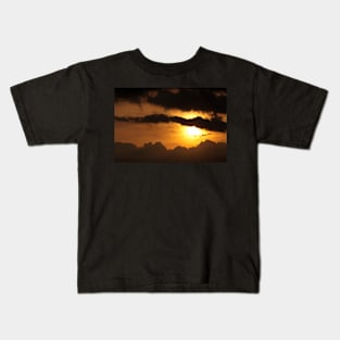 Dramatic sunset with dark clouds Kids T-Shirt